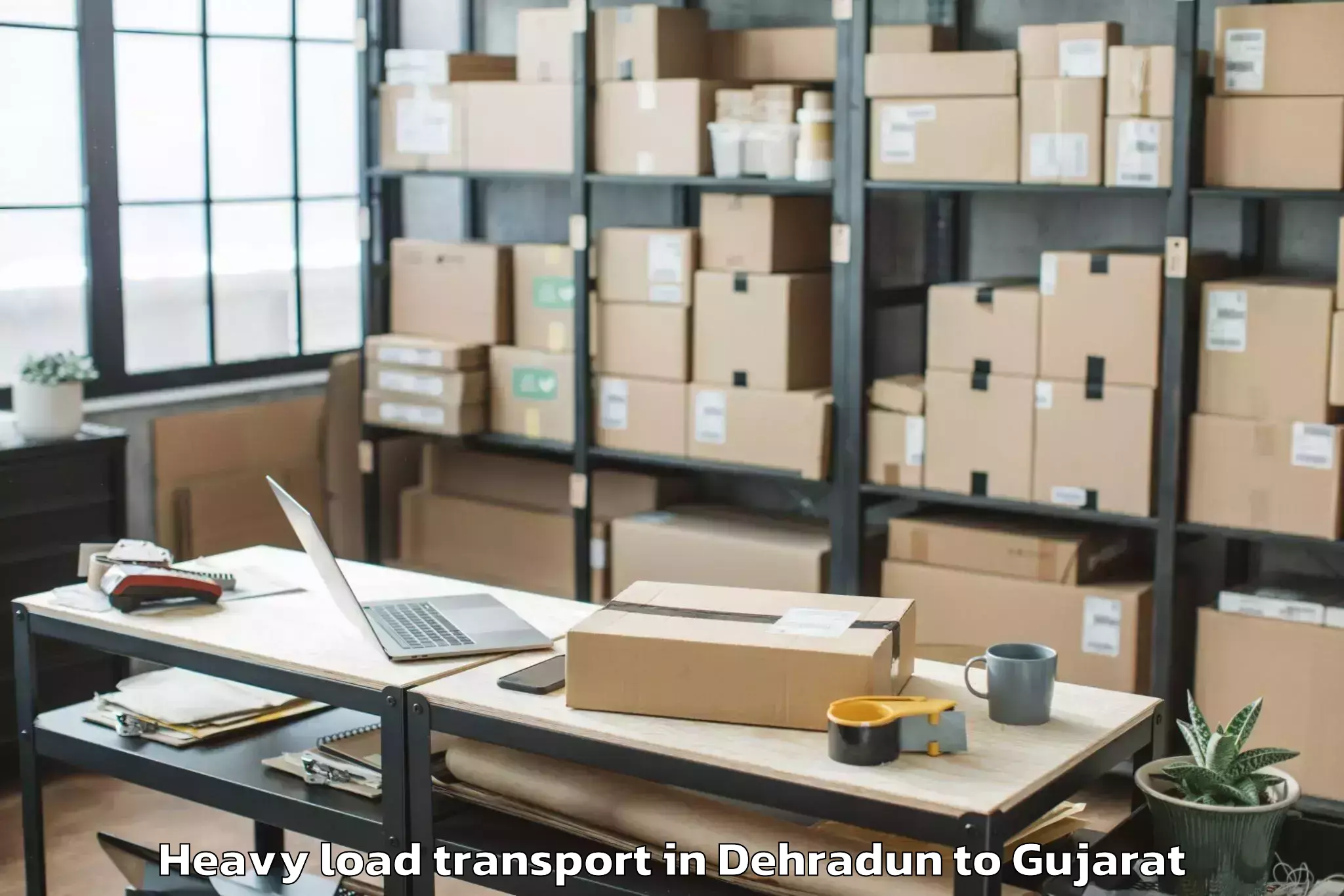 Book Dehradun to Jodiya Bandar Heavy Load Transport Online